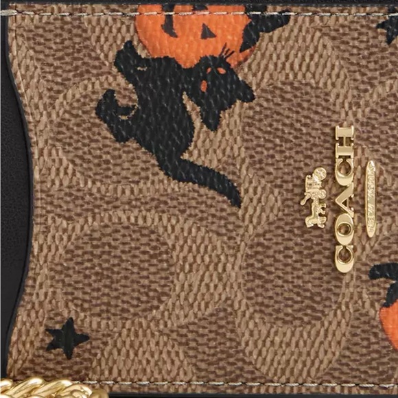 COACH
Zip Card Case In Signature Canvas With Halloween Print 2024 - Picture 3 of 5